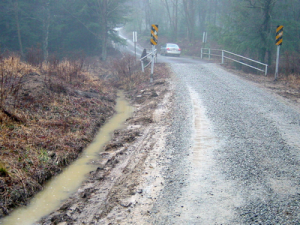 Dirt roads were made for driving, but not driving rain. (via Center for Dirt and Gravel Road Studies)